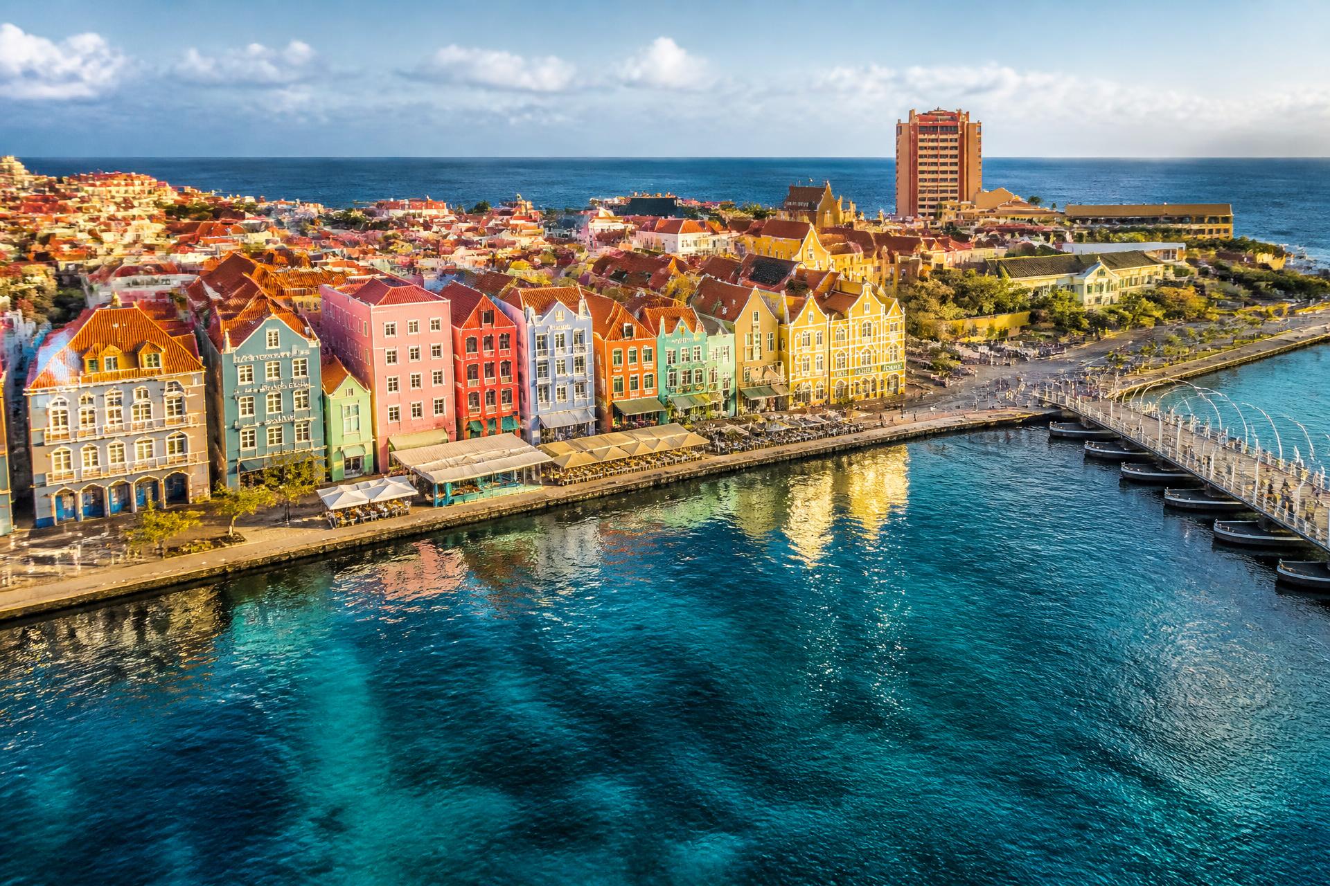 Willemstad, Curaçao — pastel Handelskade waterfront on the turquoise Caribbean